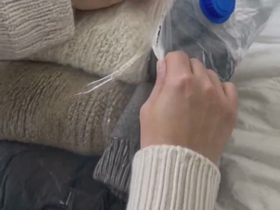 A plastic vacuum bag ripping at the seam